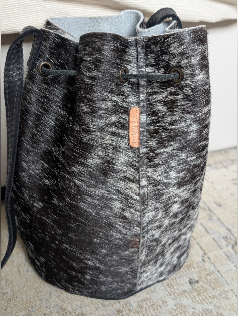 byINABE Black & White Cowhide Bucket Bag
